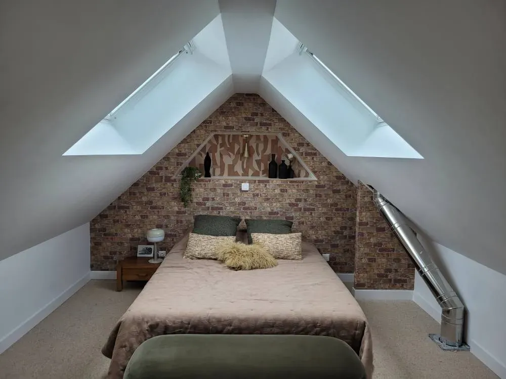 Amenagement de combles avec lit